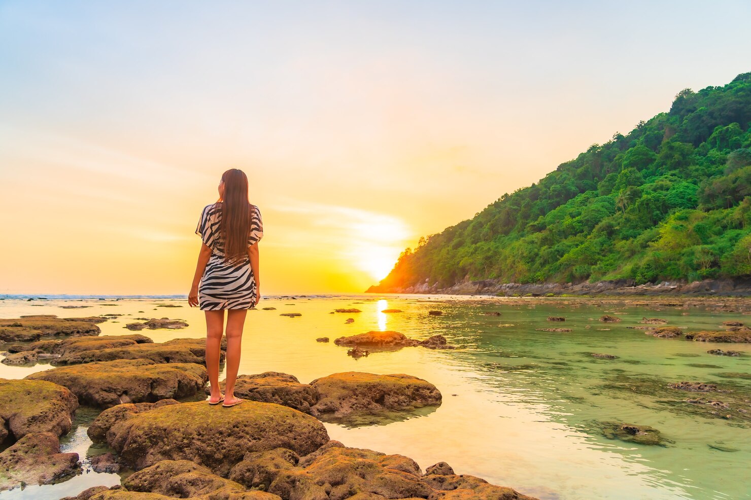 A woman on a beach during her 5-day trip to Andaman.