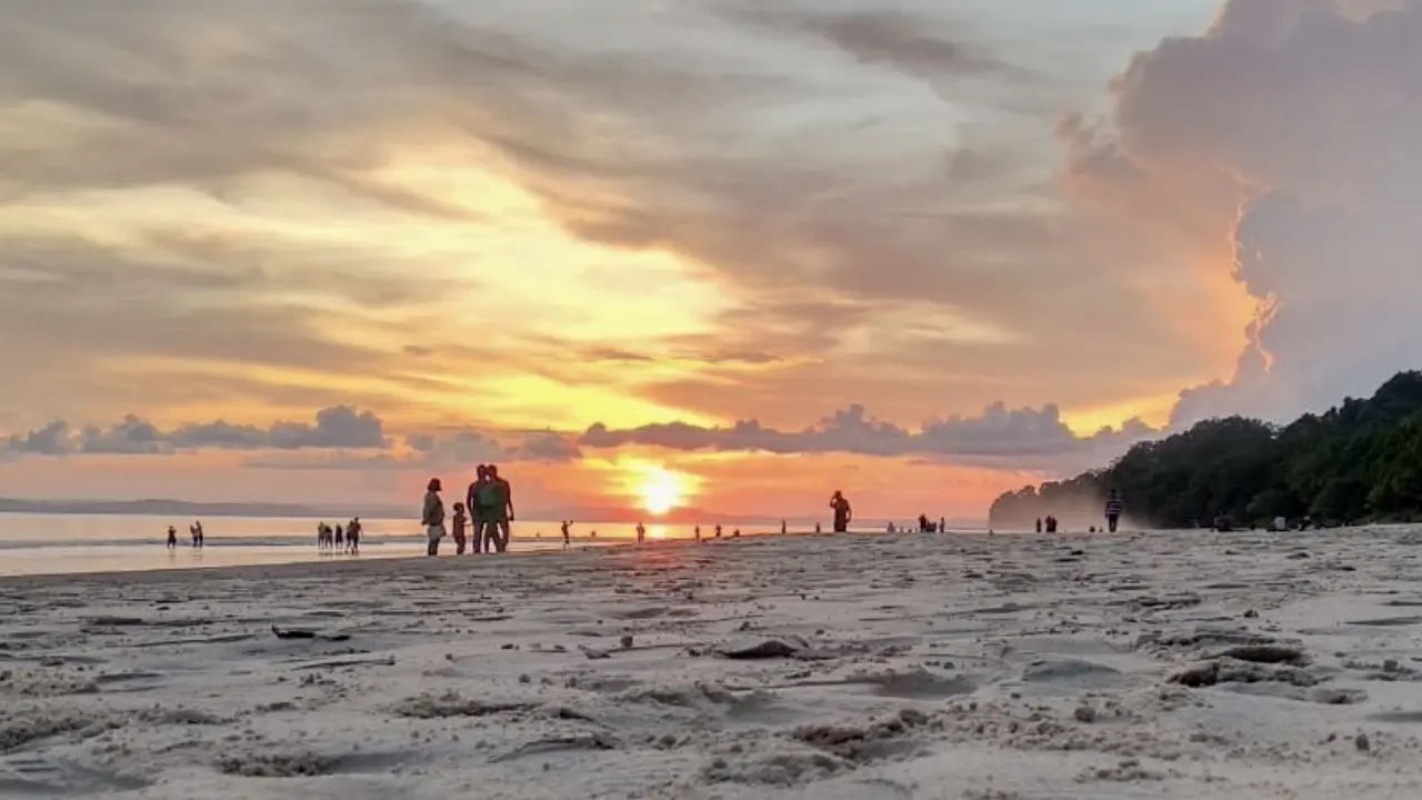 Sunset view at Radhanagar Beach, Andaman Islands with golden sky and calm waves