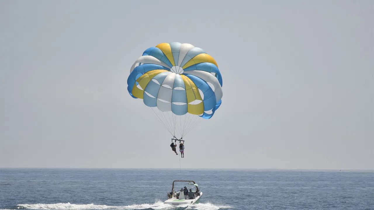 Parasailing at Elephant Beach with panoramic ocean views